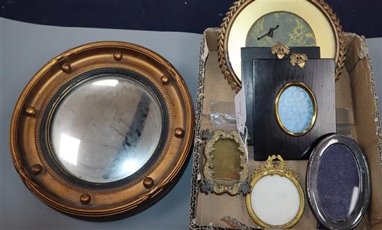 A collection of miniature photograph frames